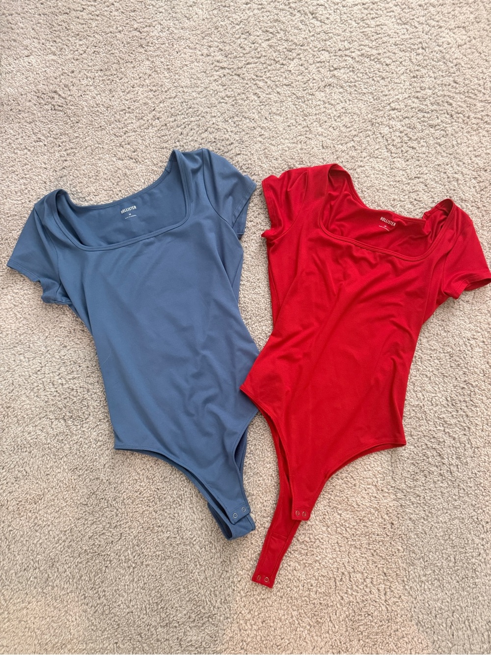Two Hollister Blue & Red Scoop Neck Bodysuits